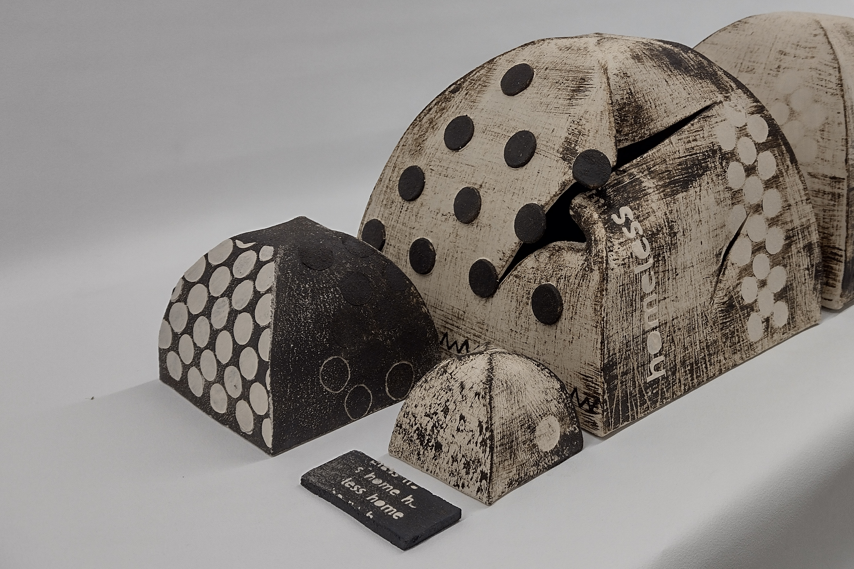Home Homeless. Slab built stoneware with stencils and slips