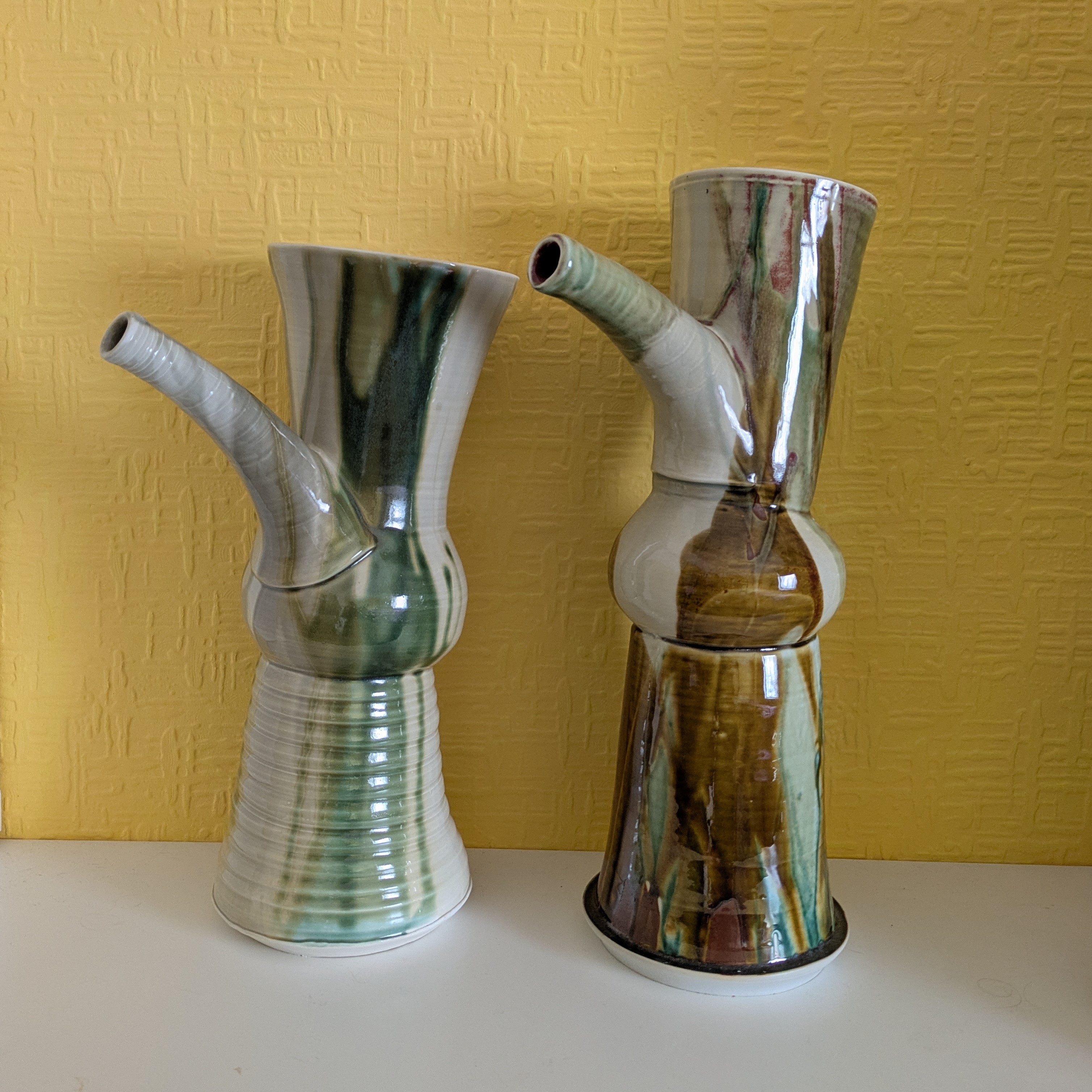Two fiesta jugs, 38 & 41 cms, reduced porcelain